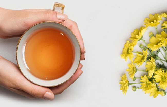 cup of tea with flowers